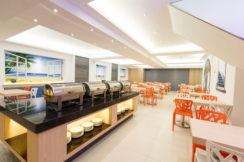 Wecan Hotel Гаосюн Экстерьер фото