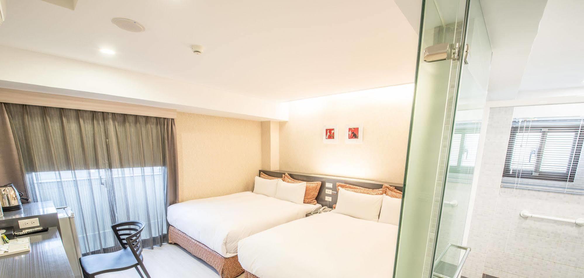 Wecan Hotel Гаосюн Экстерьер фото