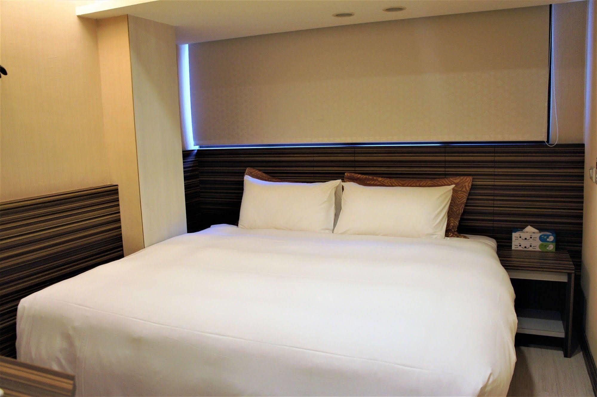 Wecan Hotel Гаосюн Экстерьер фото