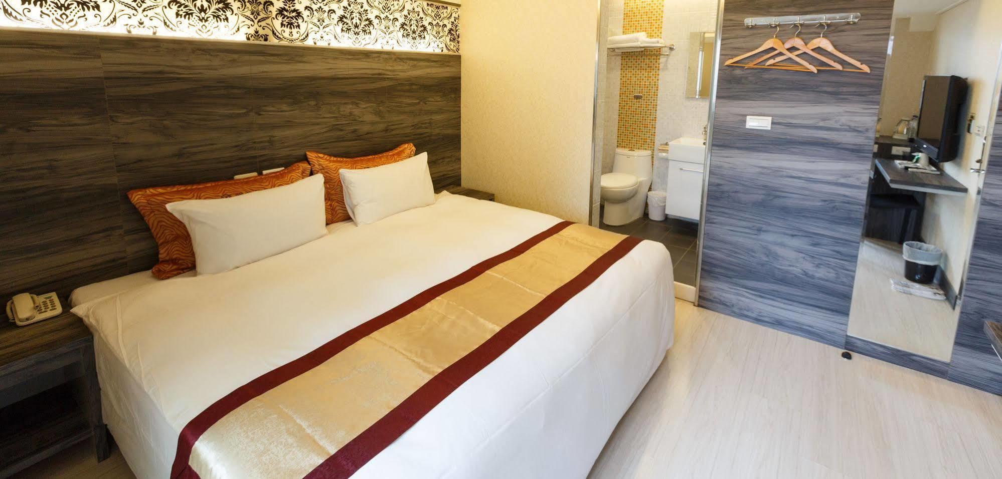 Wecan Hotel Гаосюн Экстерьер фото