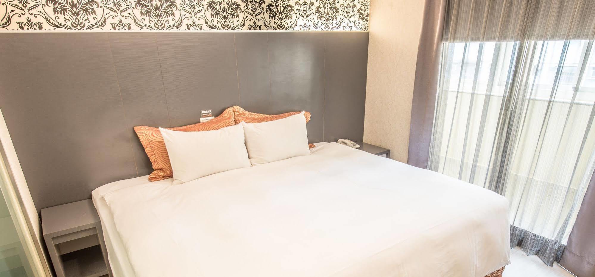 Wecan Hotel Гаосюн Экстерьер фото
