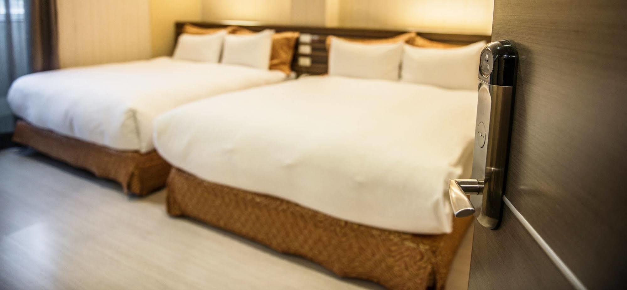 Wecan Hotel Гаосюн Экстерьер фото