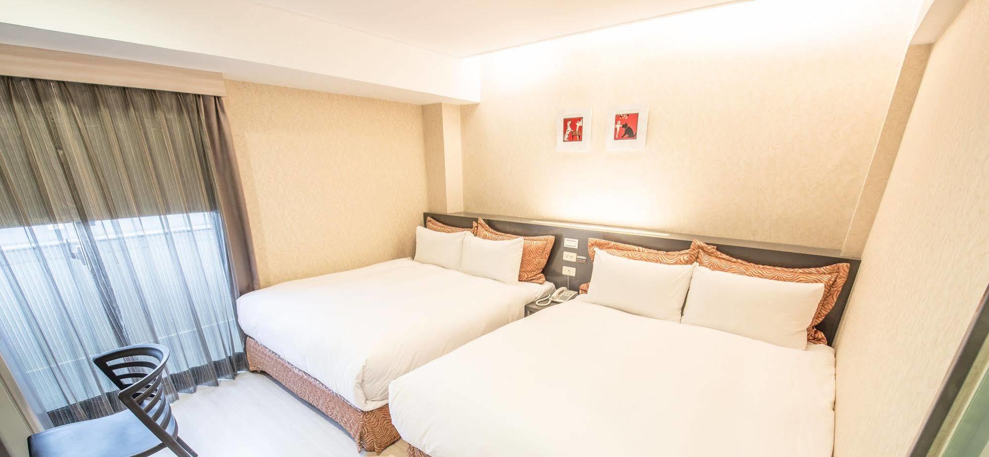 Wecan Hotel Гаосюн Экстерьер фото