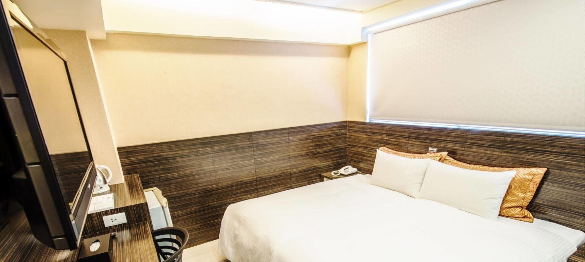 Wecan Hotel Гаосюн Экстерьер фото