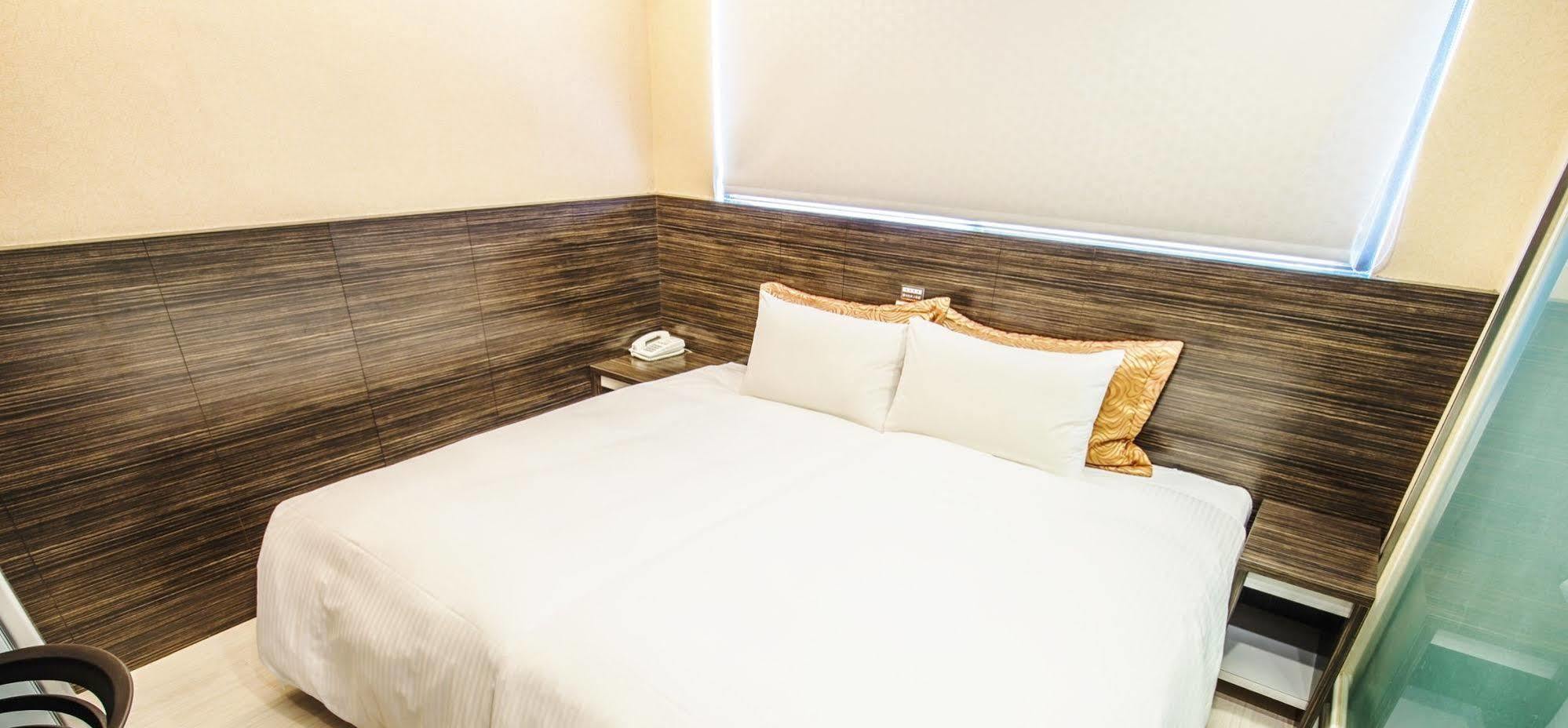 Wecan Hotel Гаосюн Экстерьер фото